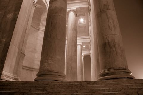 The Jefferson Memorial colonnade on a night of snow