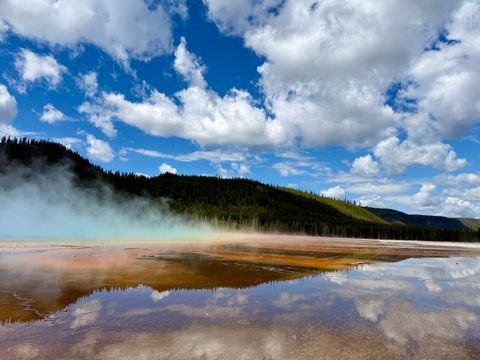 Runoff terraces at Grand Prismatic reflecting the sky